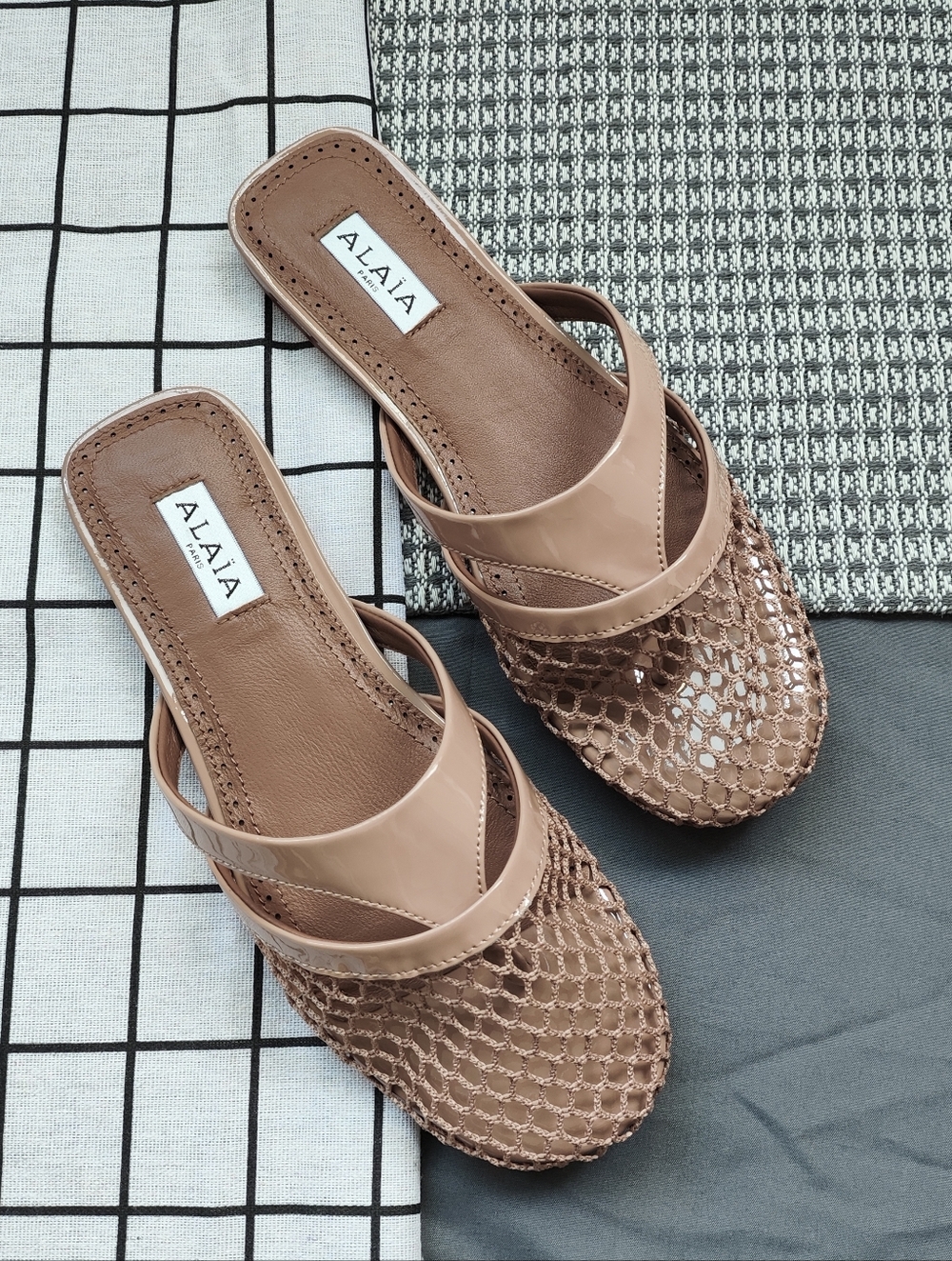 ALAÏA Nude Mesh Flat Mules